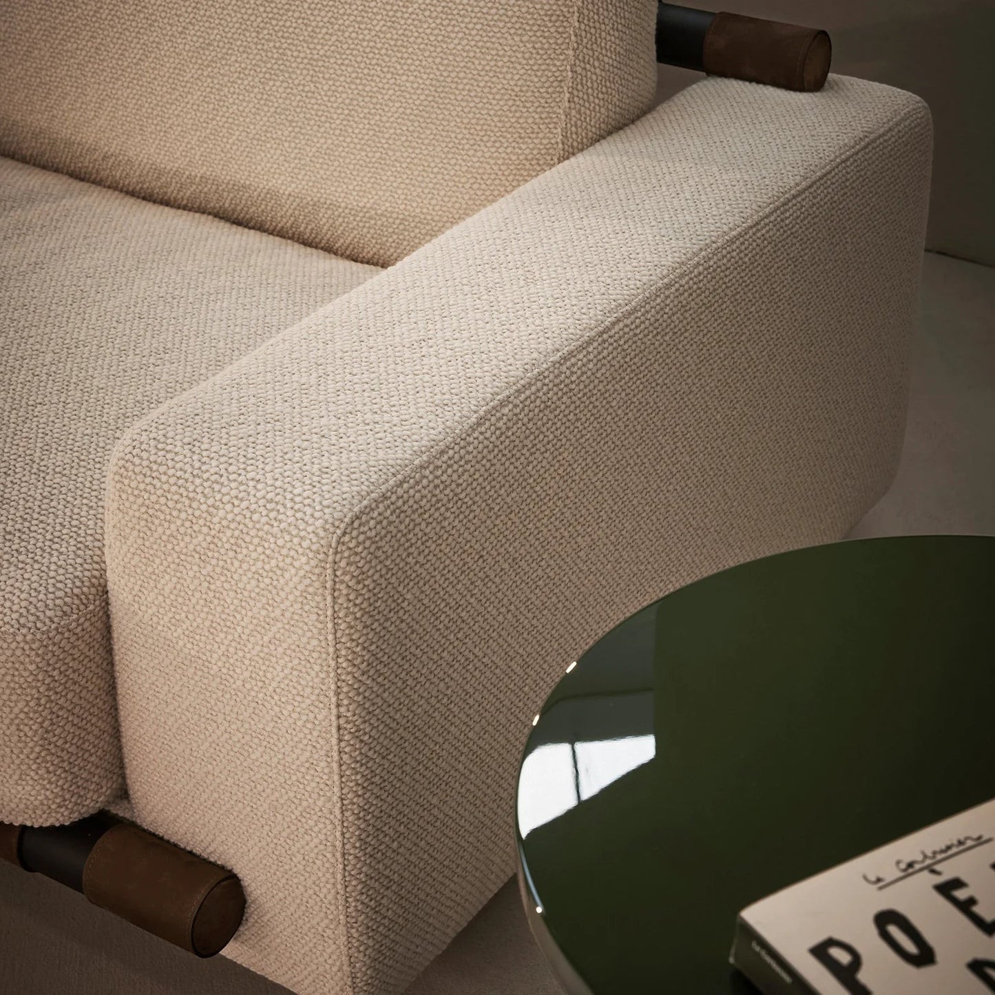 Ambrosia Concepts Elegenza 3-seater sofa in ivory boucle fabric with solid teakwood base and dark brown leather accents.