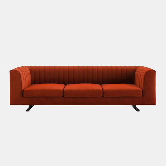 Ambrosia Concepts Calgaris 4-seater sofa in burnt orange textured fabric with channel tufting and dark metal legs.