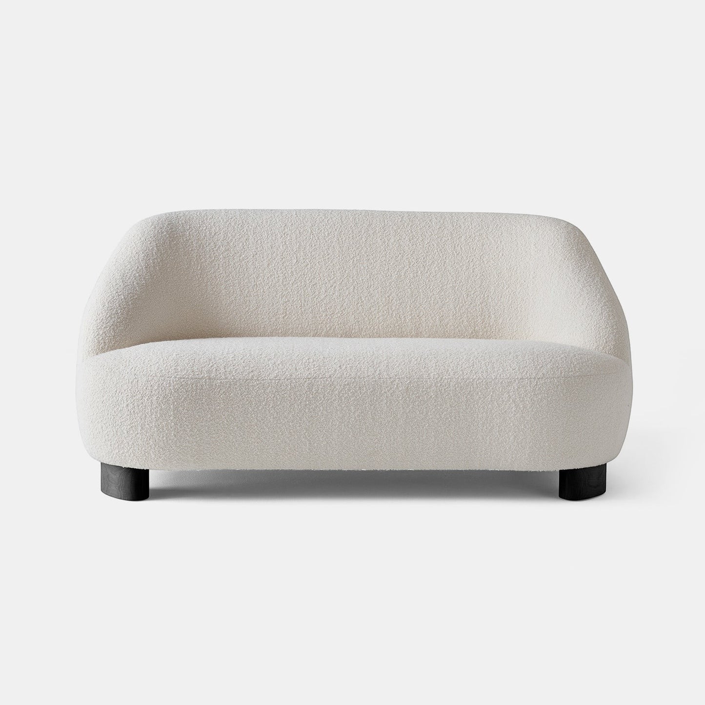 Ambrosia Concepts cream boucle 2-seater sofa with curved silhouette and dark wood legs.