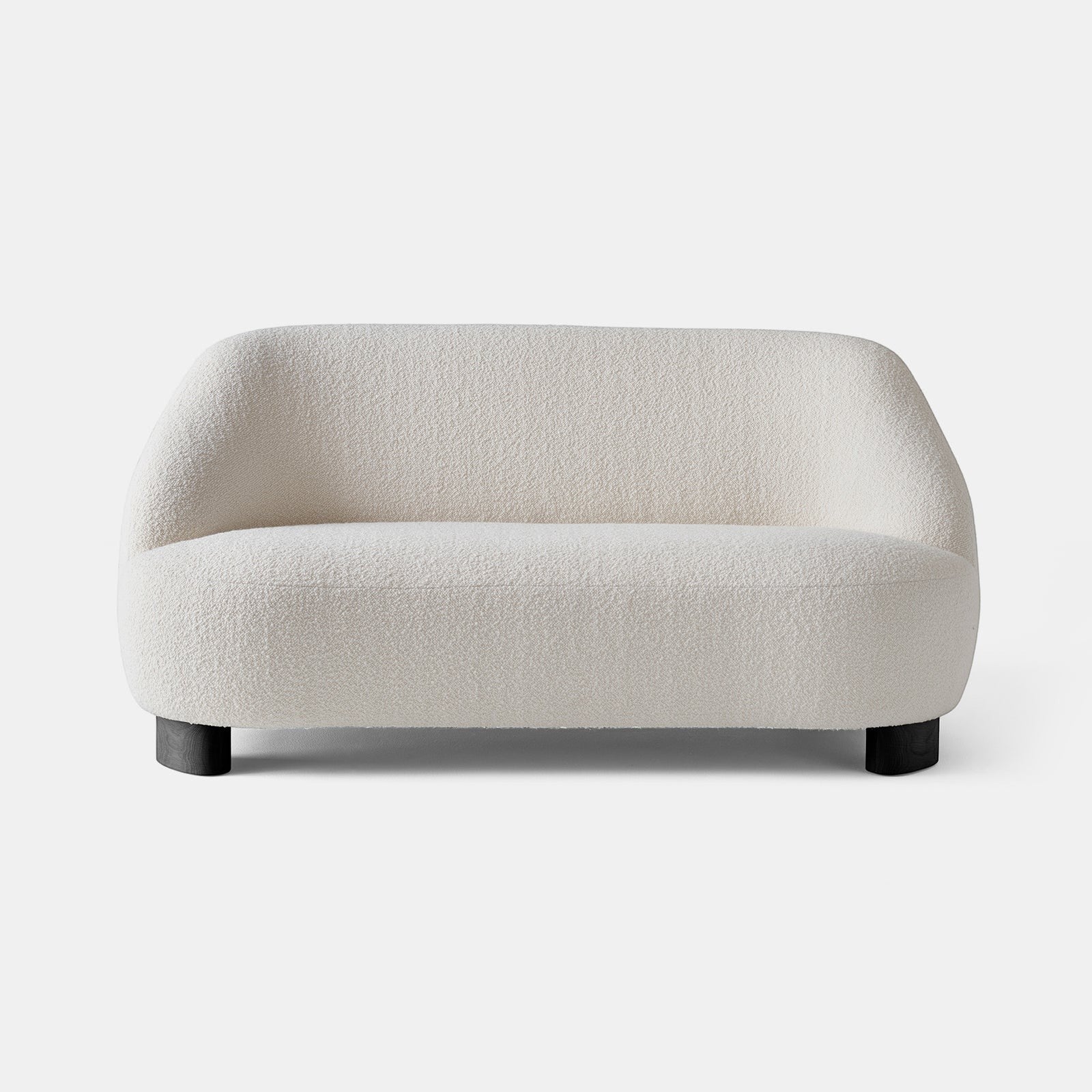 Ambrosia Concepts cream boucle 2-seater sofa with curved silhouette and dark wood legs.