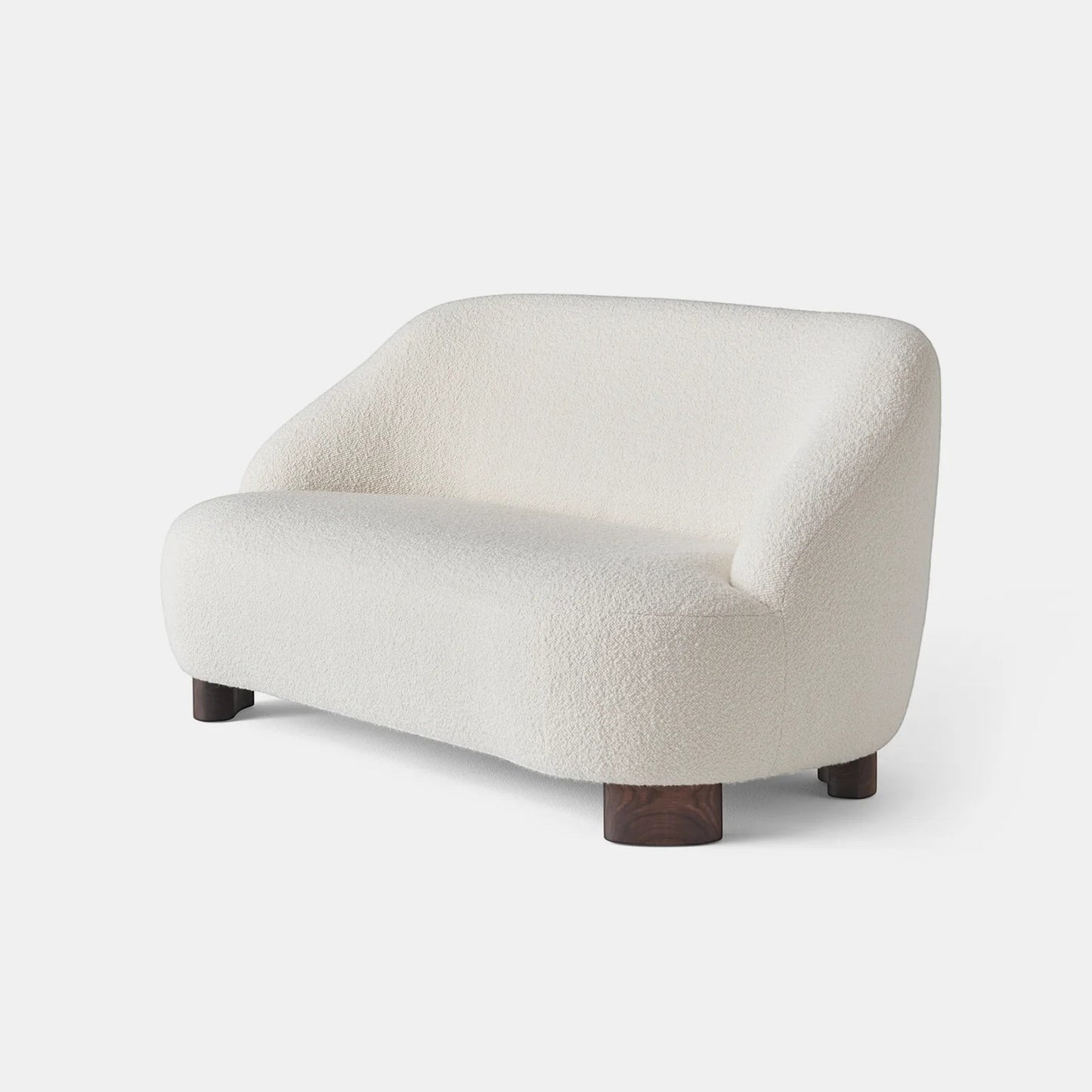 Ambrosia Concepts cream boucle 2-seater sofa with curved silhouette and dark wood legs, perfect for modern living rooms.