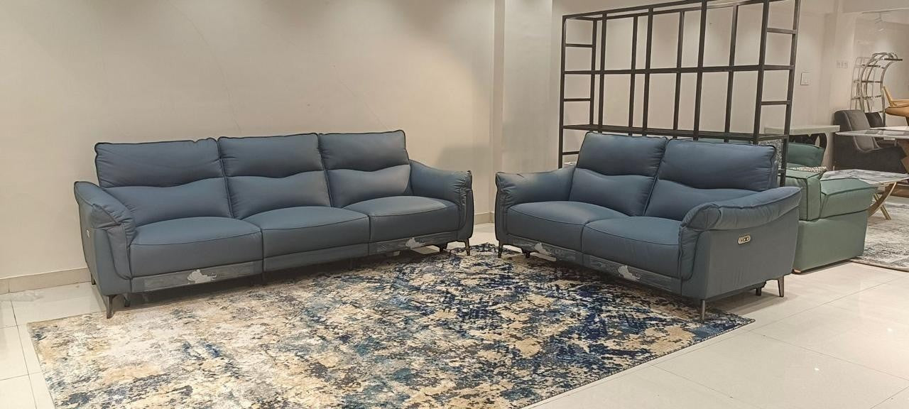 Ambrosia Concepts Germain blue leather 3+2 motorised recliner sofa set with plush cushioning and modern design.