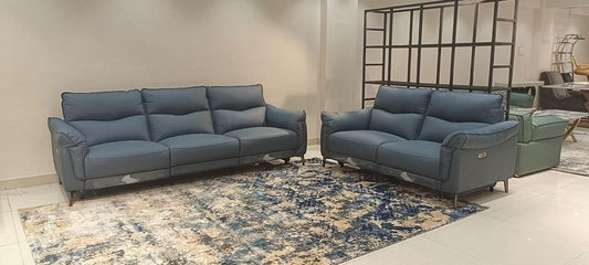 Ambrosia Concepts Germain blue leather 3+2 motorised recliner sofa set with plush cushioning and modern design.