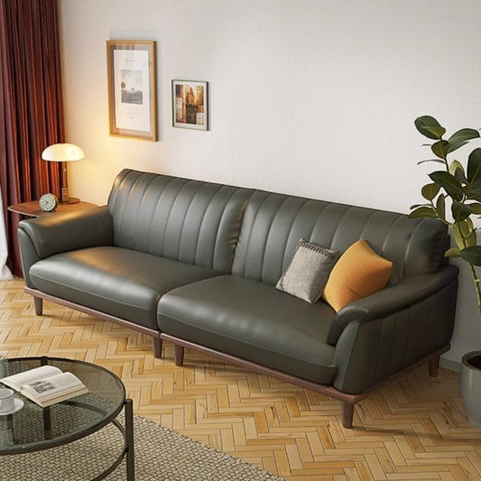Ambrosia Concepts Arkel 3 Seater Sofa in deep green faux leather with channel tufting and wood legs.