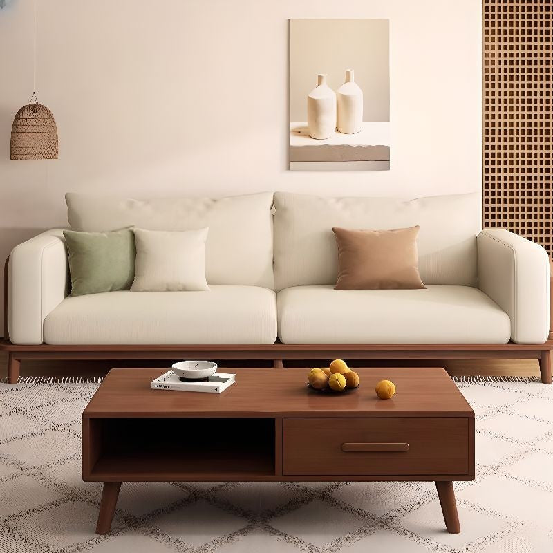 Ambrosia Concepts Joshua 3 Seater Sofa in cream fabric with walnut wood frame and slatted armrests, styled with decorative pillows.